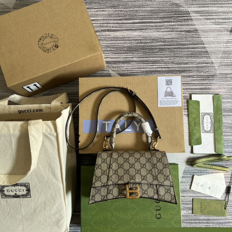 G*u*i top handle bags